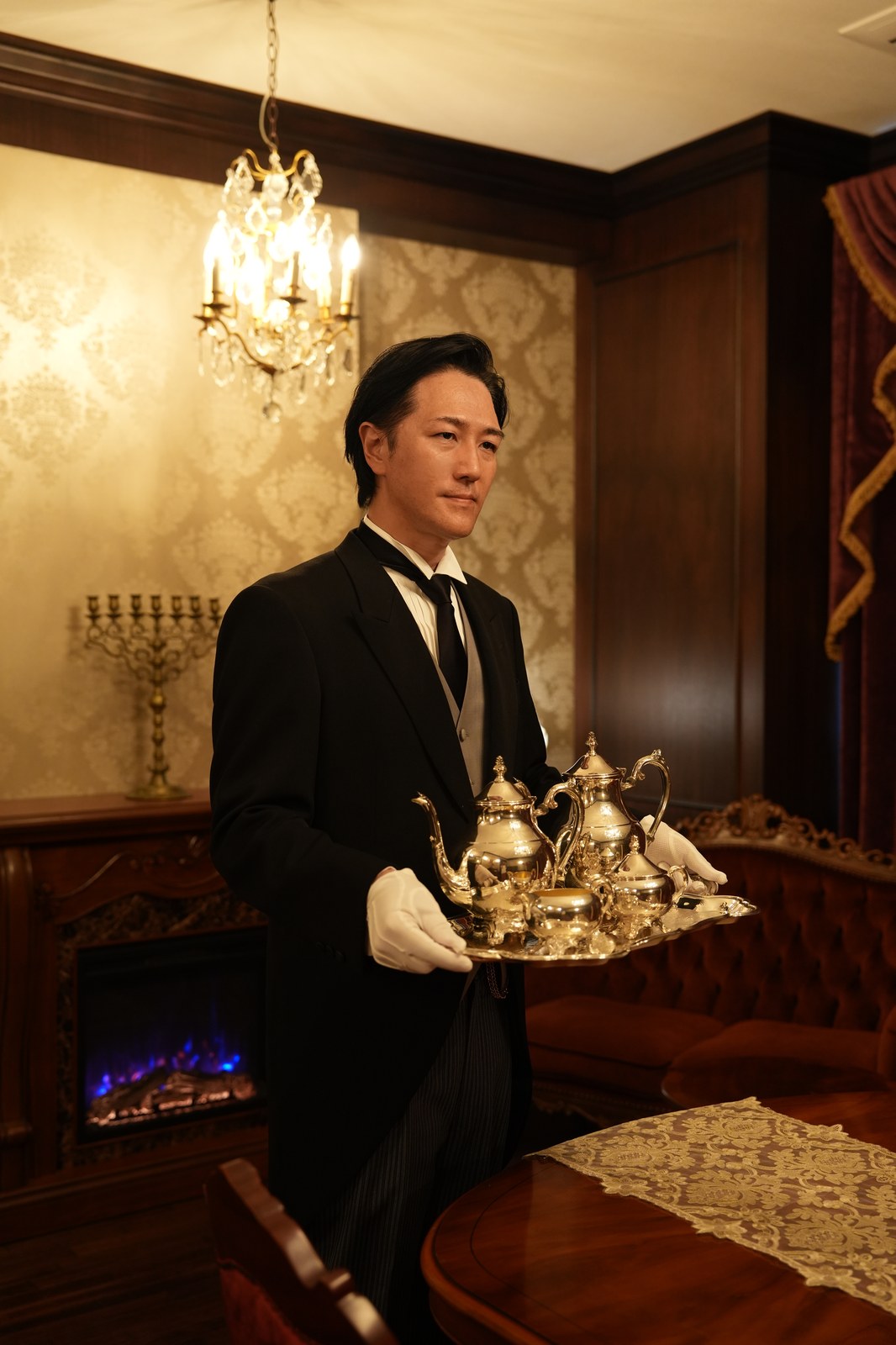 Butler Bell waiting with a silver tray (photograph from the Butler Bell site)