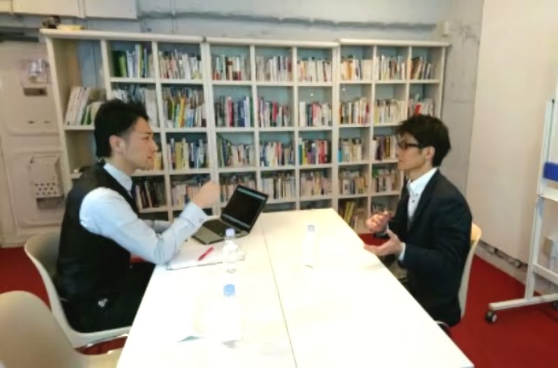 Speaking about working with clients (photograph from the Family Romance site)