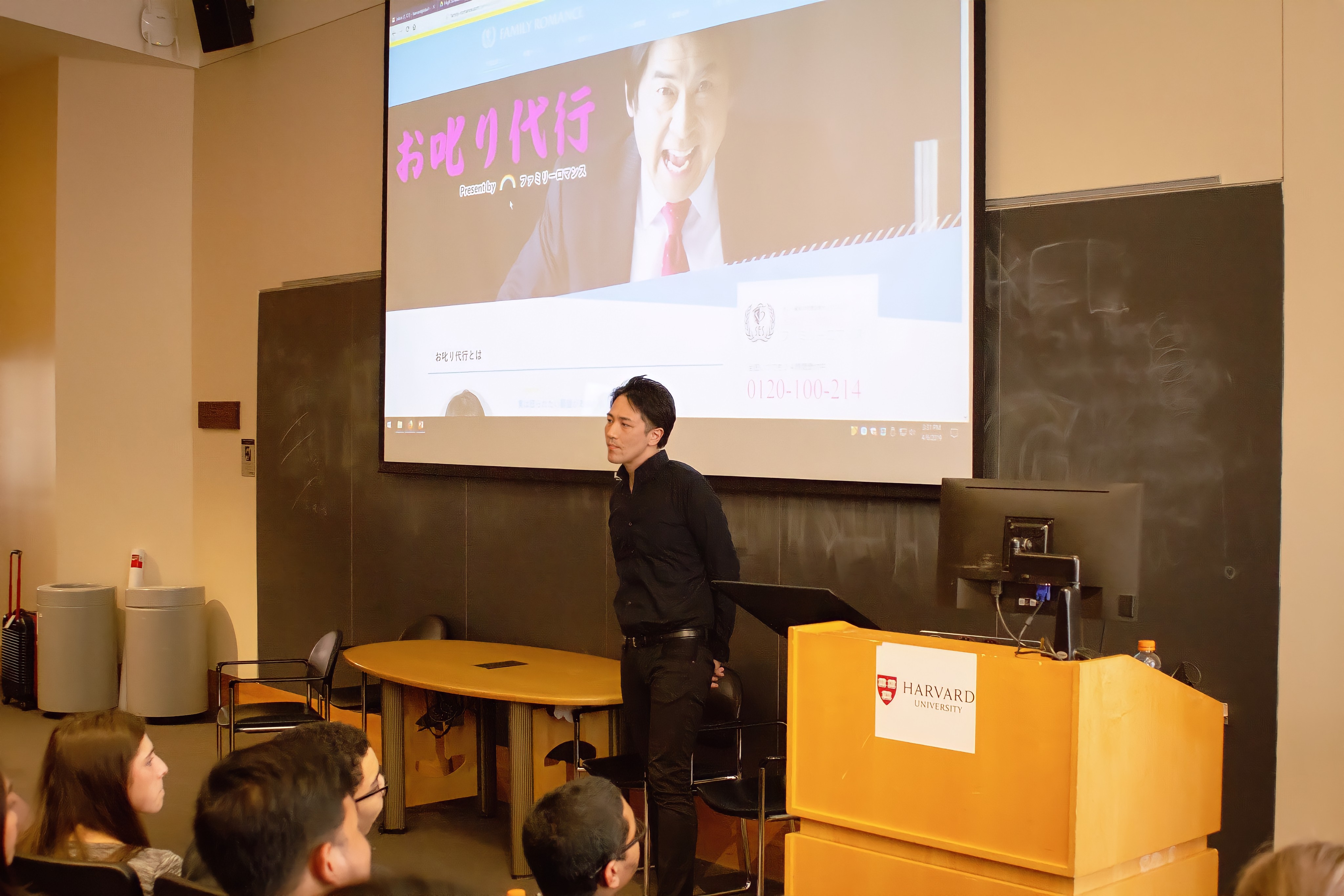 ハーバード大学の講演で家族代行サービスについて語る石井裕一