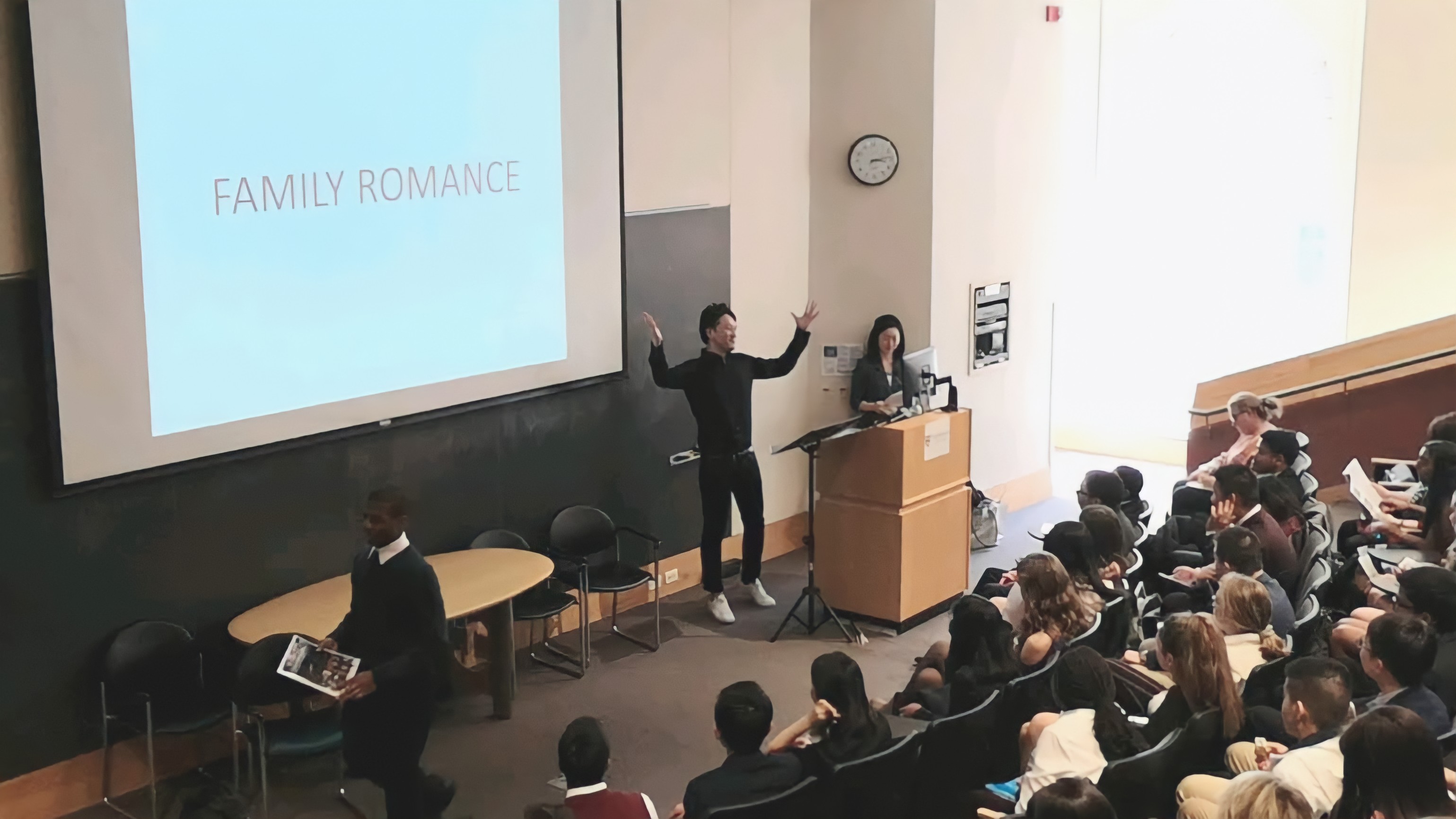 Yuichi Ishii facing the audience at the Harvard lecture (official site photograph)